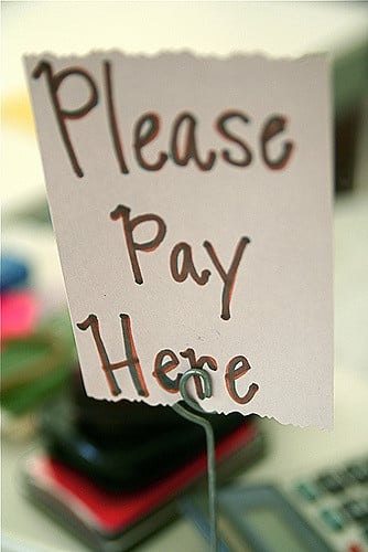 photo of sign "please pay here"